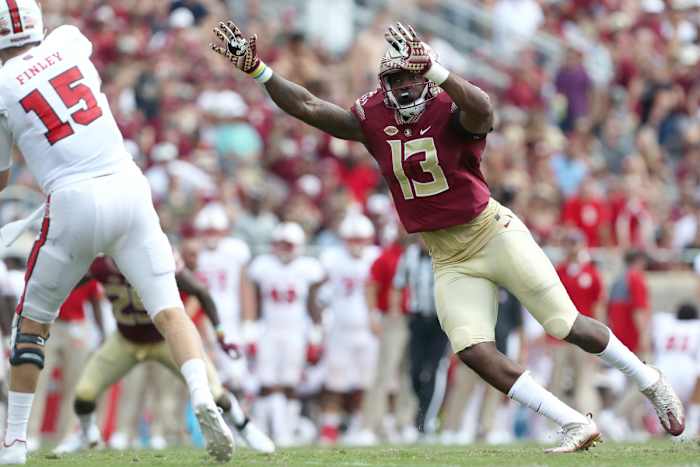 Date Unknown; Tallahassee, FL, USA; FSU defensive end Joshua Kaindoh closes in on NC State quarterback Ryan Finley during the Seminoles' home opener at Doak Campbell Stadium last year. Mandatory Credit: Joe Rondone-USA TODAY NETWORK